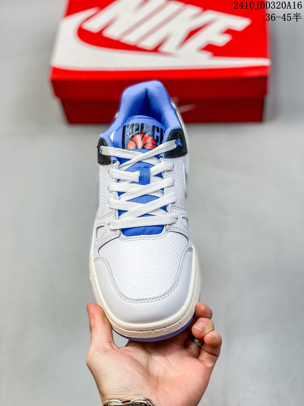 Front view of a white Nike Full Force Low sneaker with blue tongue and white laces.