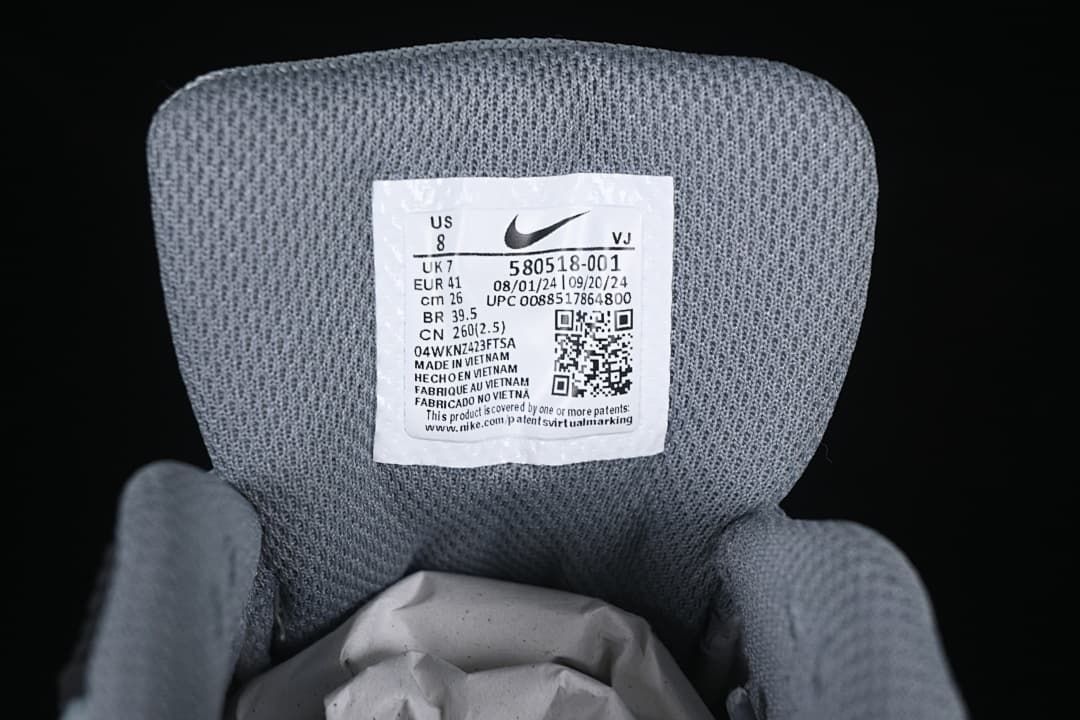 Tongue label showing size US 8, UK 7, EU 41, and style code 580518-001