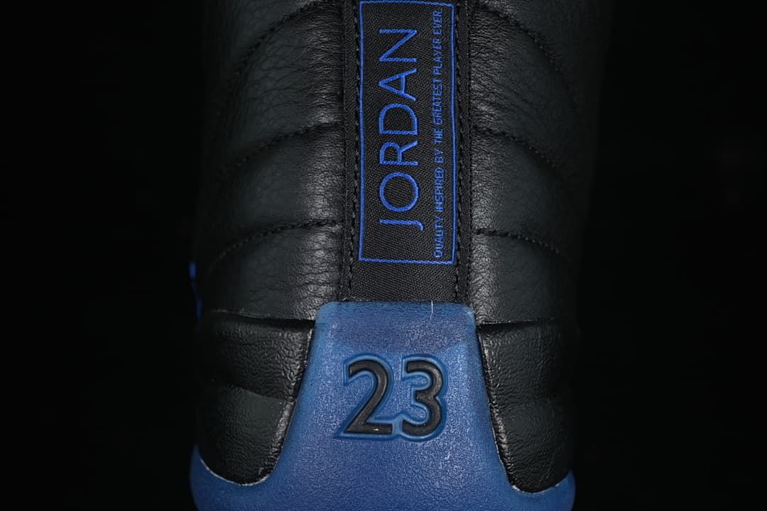 Rear view showing blue heel details and the number 23