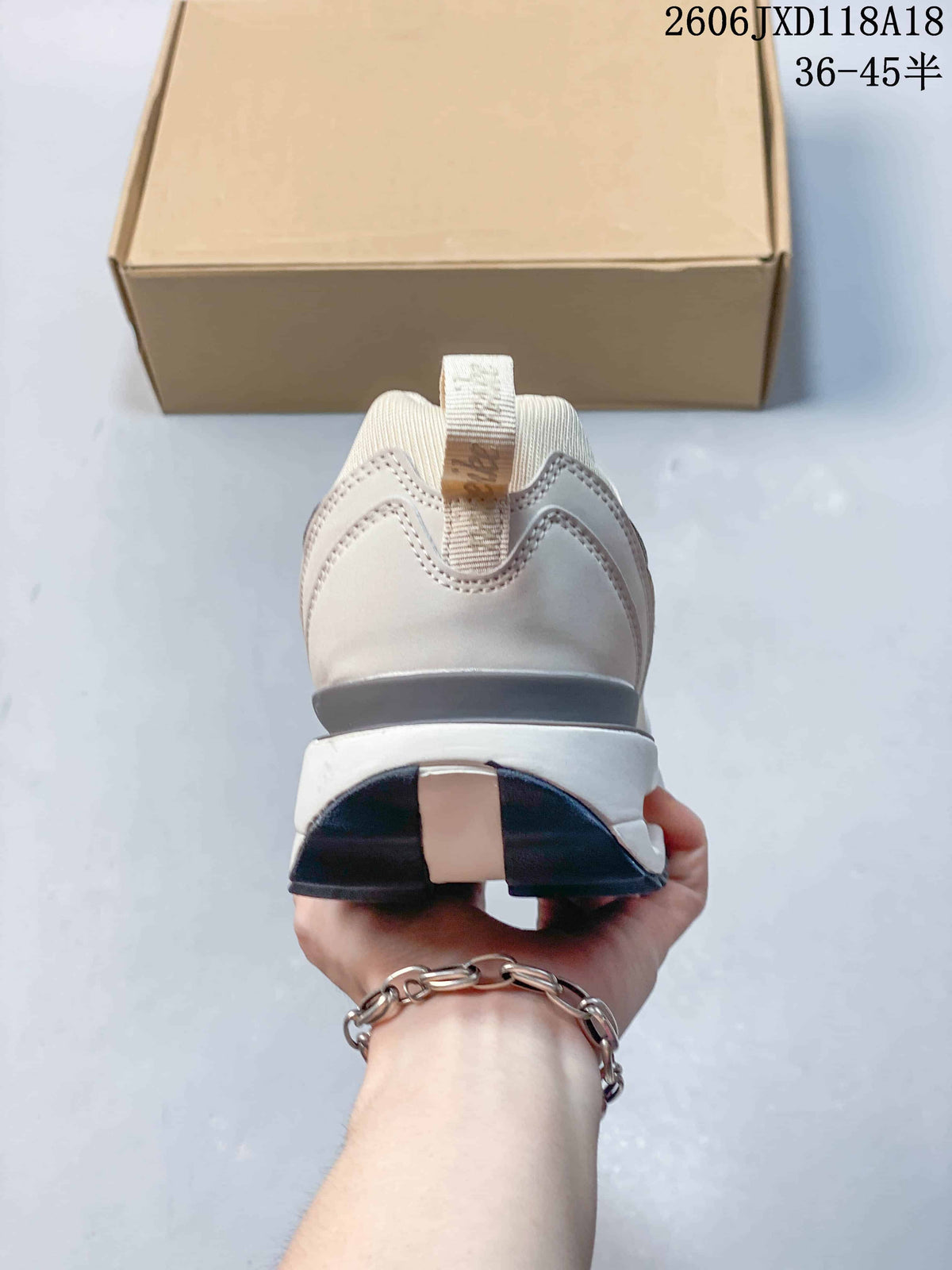 Rear view of a Nike Air Max Dawn sneaker showing the heel and outsole