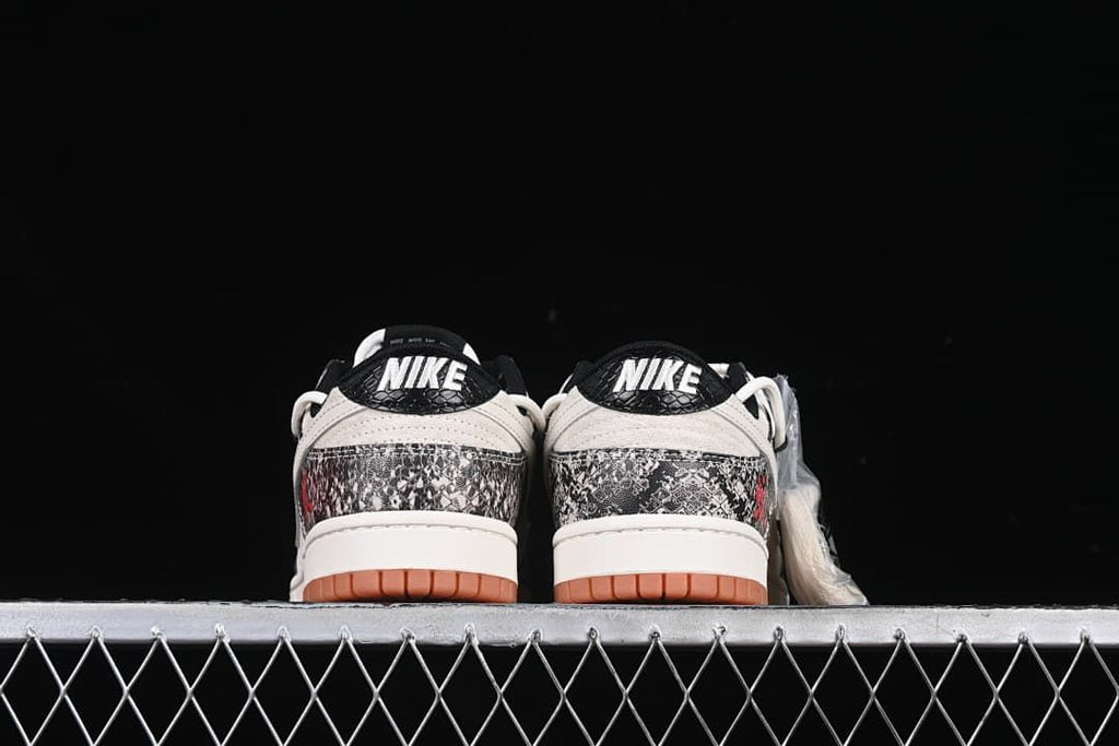 Rear view of both sneakers showing patterned heel panels and gum-colored outsoles