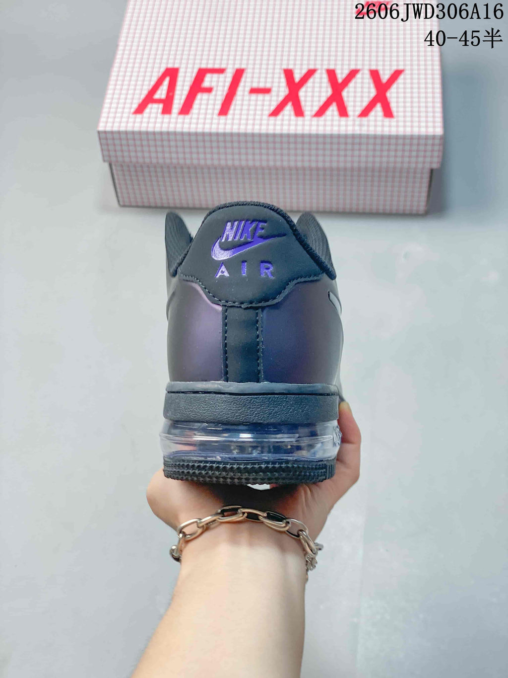 Rear view showing the heel branding and transparent heel section of the sole