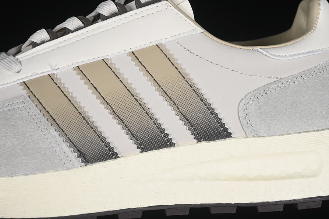 Close-up of the grey and white upper and contrasting side stripes