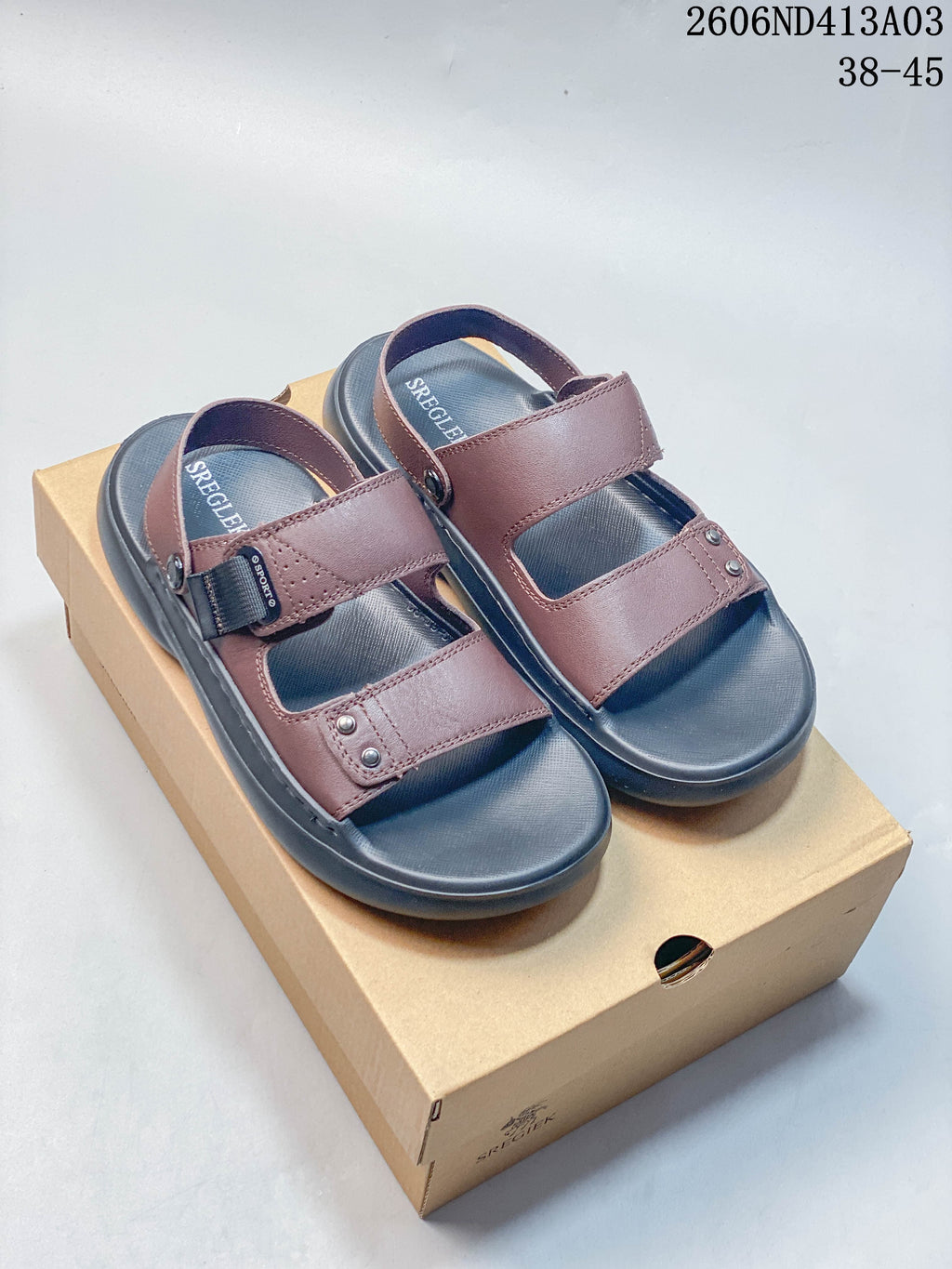 Brown adjustable strap sandals with dark soles on a box; the image states sizes 38–45.