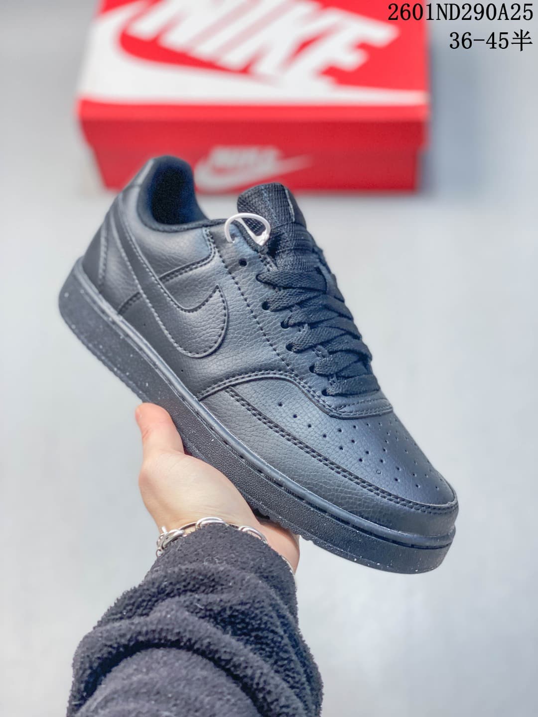 Dark gray low-top sneaker with matching laces and sole