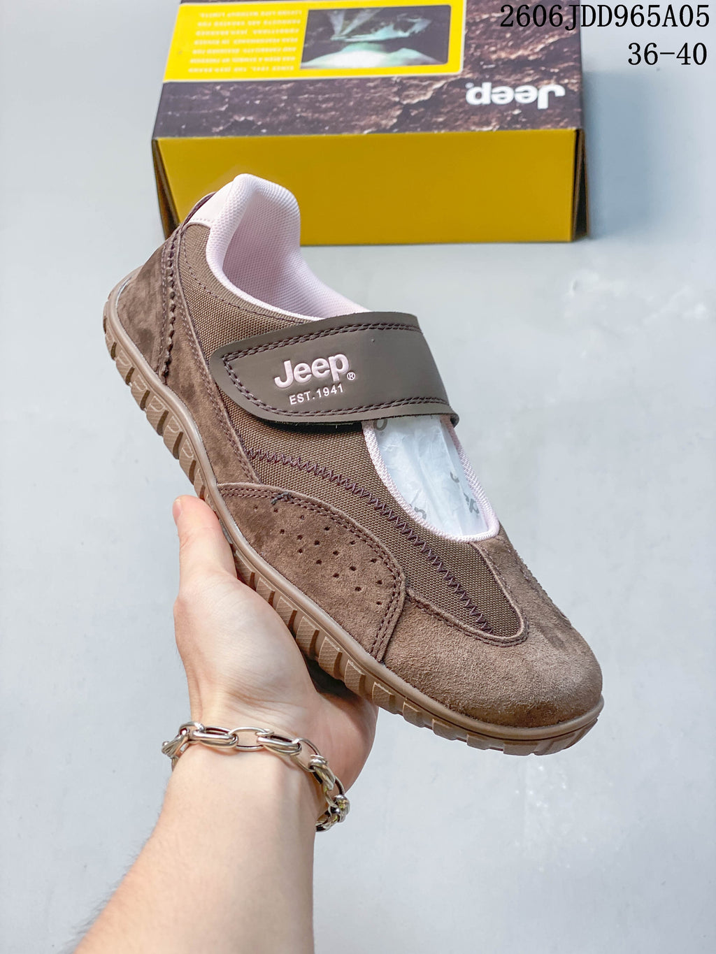 Angled view of the brown Jeep casual shoe with its broad strap and patterned sole