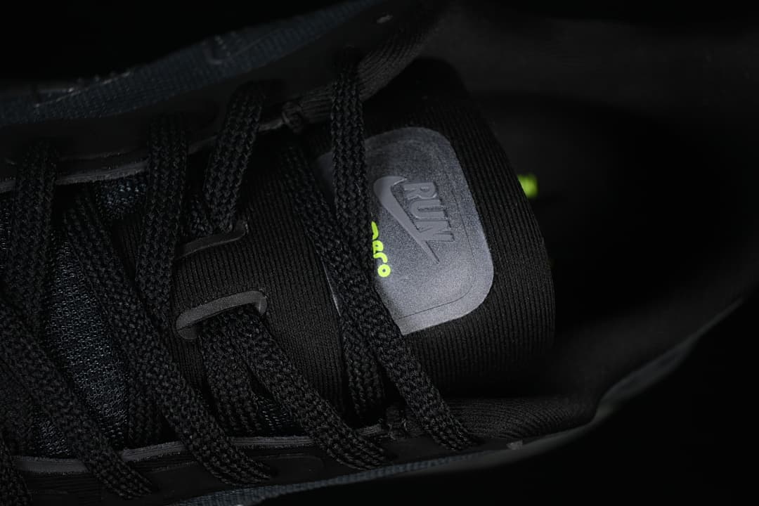 Close-up of the shoe tongue and black laces.