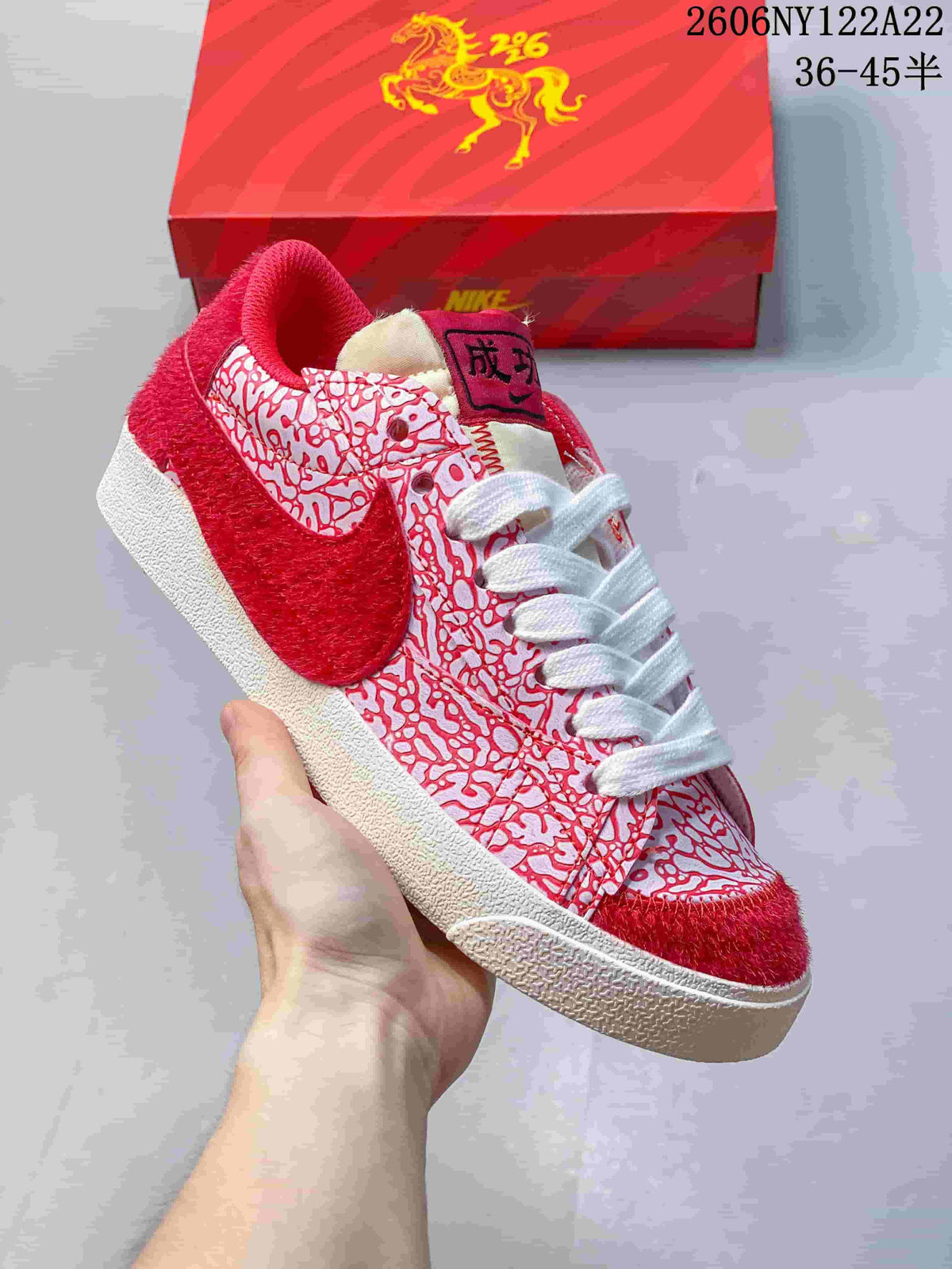 Close-up of a red-and-white patterned low-top sneaker