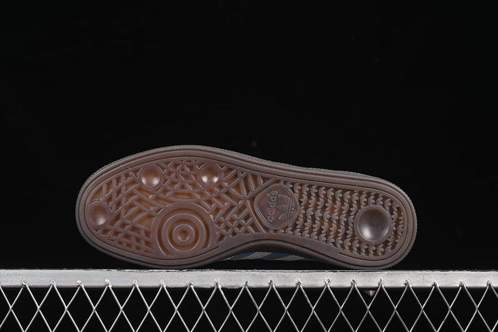 Underside view of the dark patterned outsole