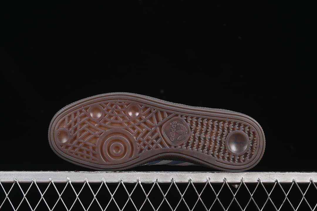 Underside view of the dark patterned outsole