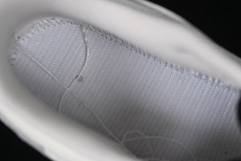 Close-up view inside the sneaker showing the lining and stitching.