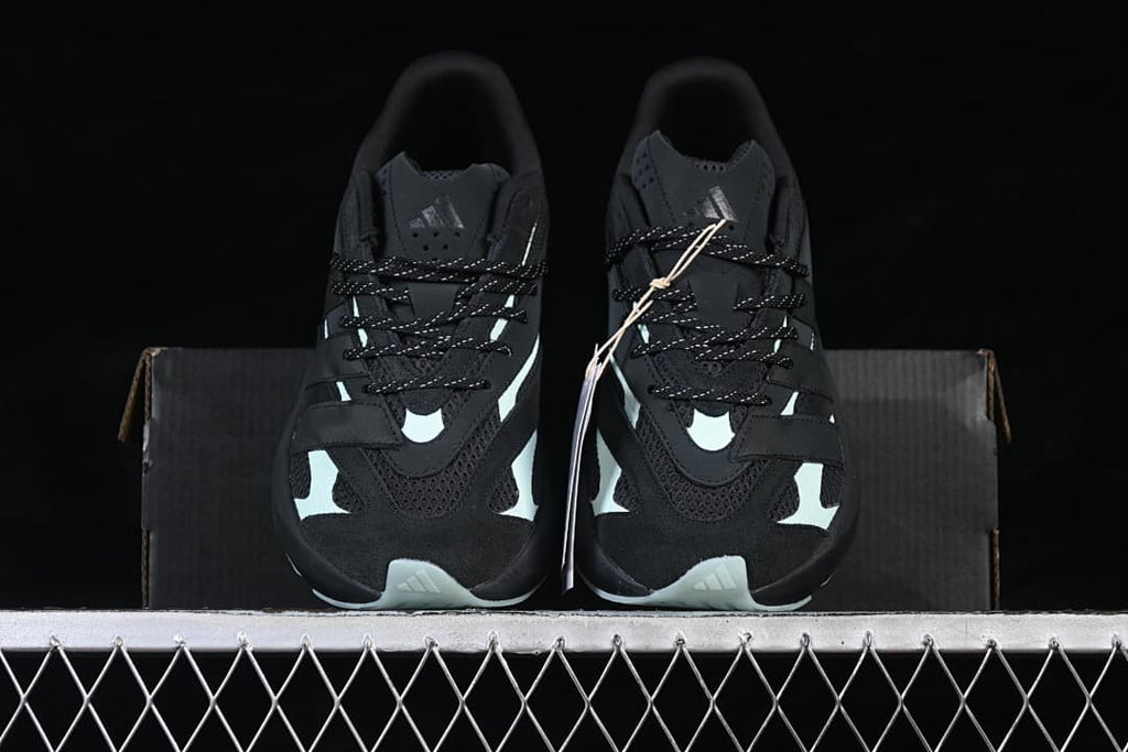 Front view of the pair with pale mint accents and black laces