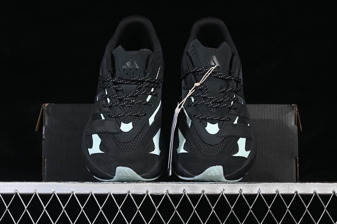 Front view of the pair with pale mint accents and black laces