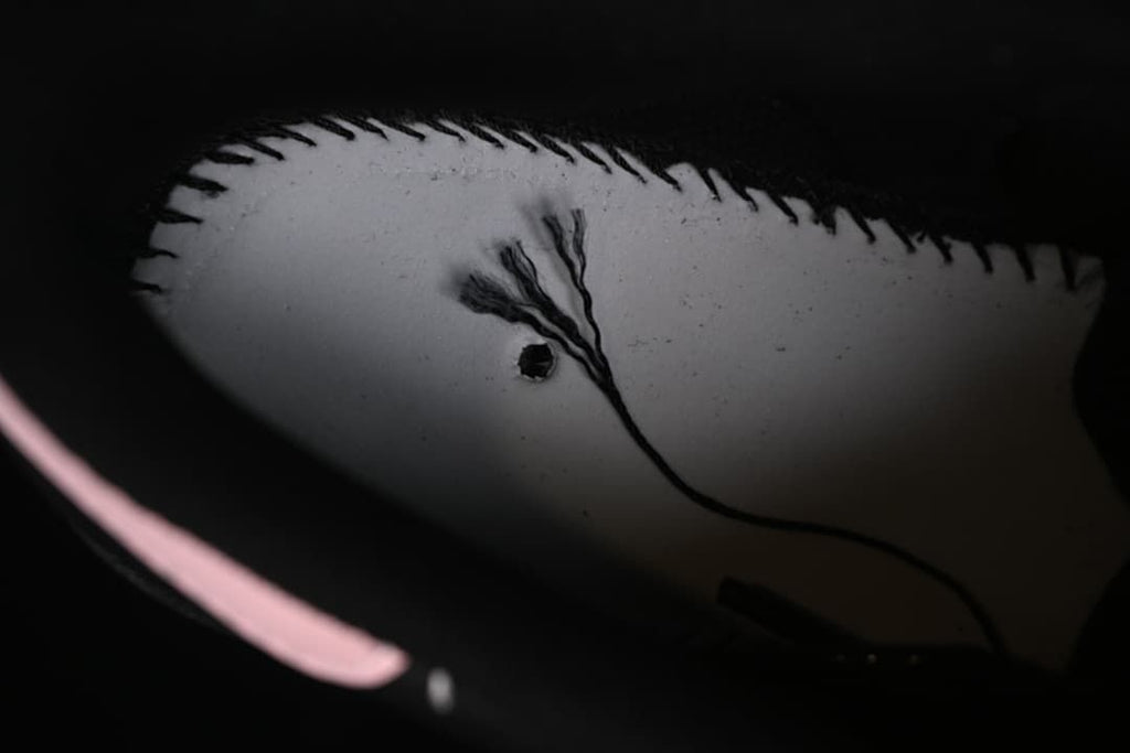 Close-up of the sneaker's interior lining and stitching