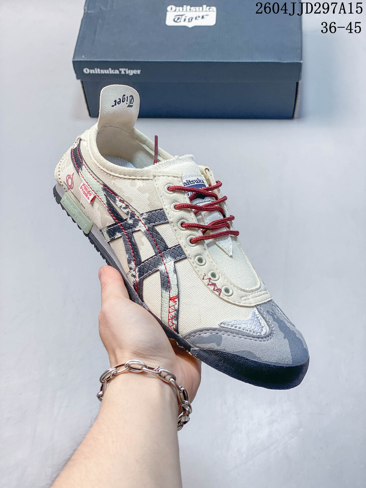 Cream Onitsuka Tiger sneaker with gray patterned overlays and burgundy laces