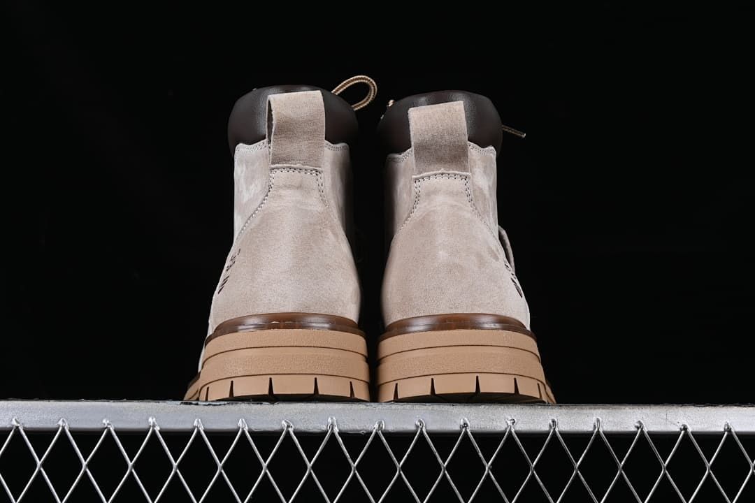 Rear view of the pair showing heel pull tabs and outsole profile