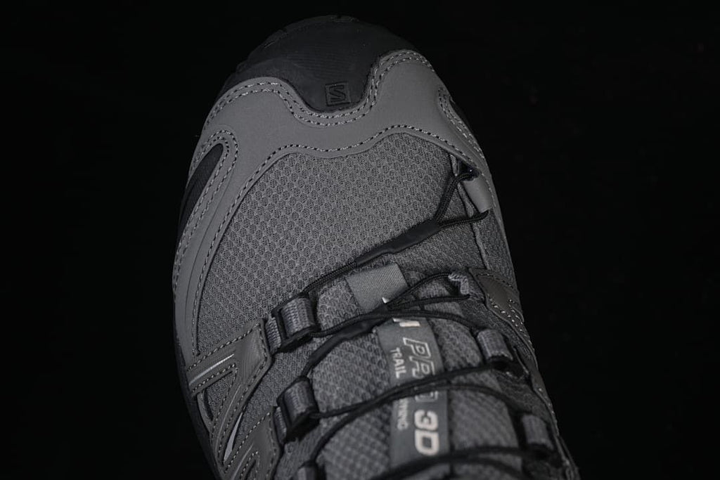 Top-down close-up of the shoe toe and quick-lace system.
