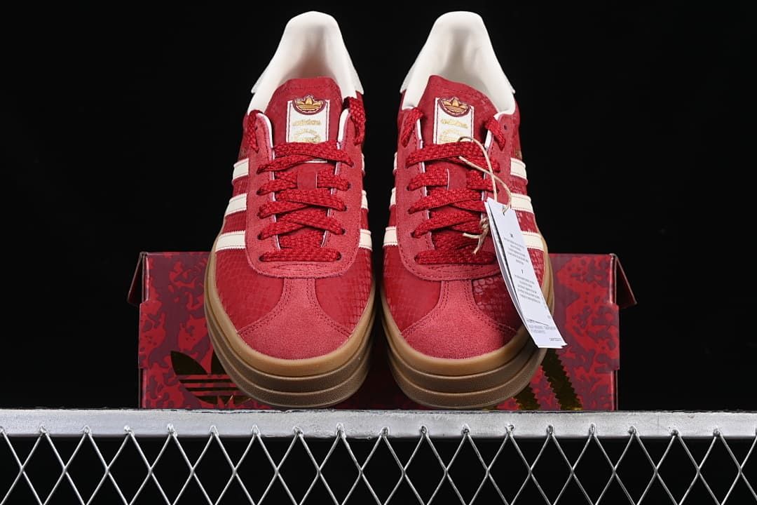 Front view of the pair with red laces and layered platform soles