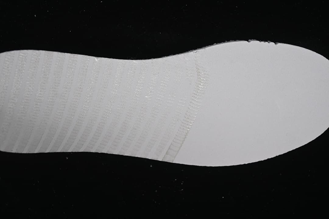 Close-up of the white textured outsole