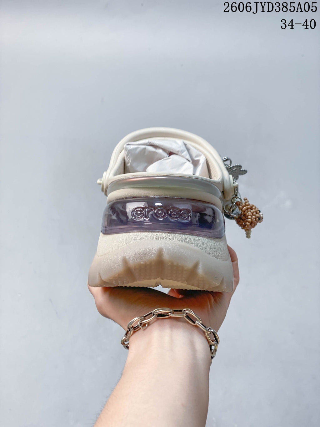 Rear view showing the translucent heel detail and movable strap