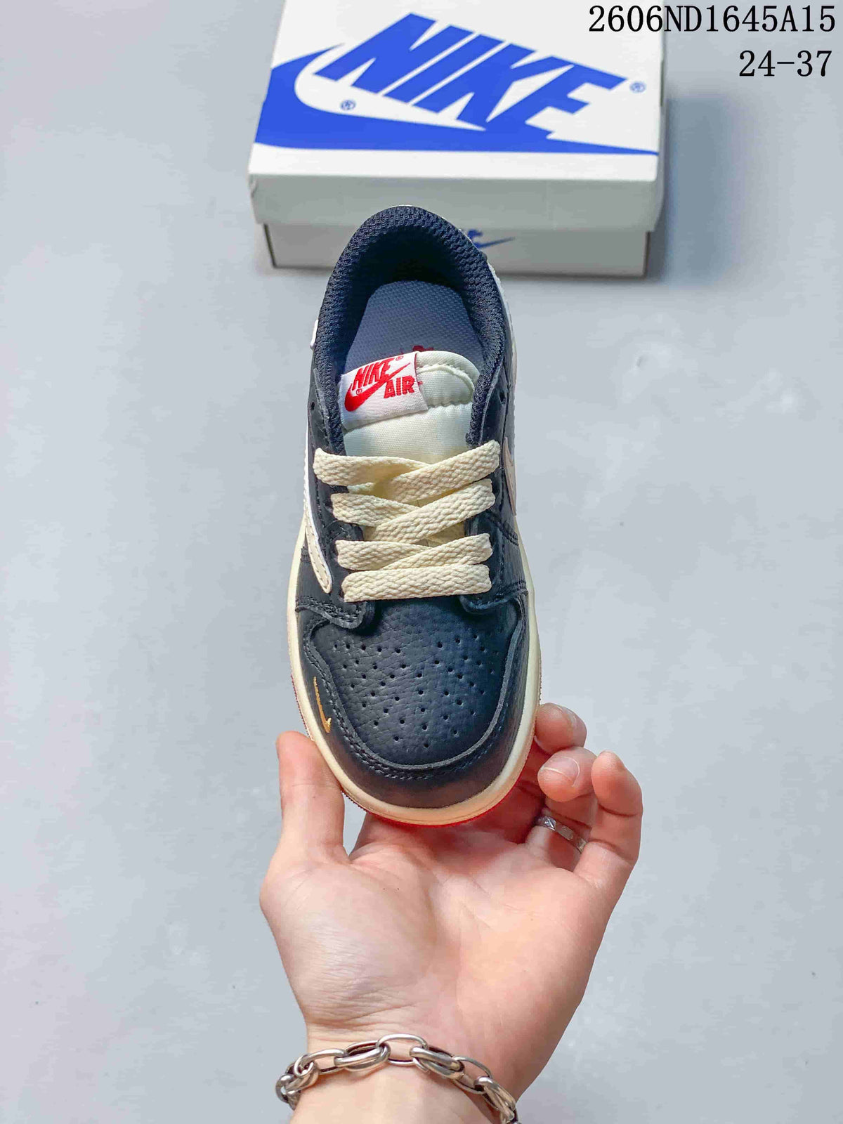 Top view showing the perforated toe box, cream laces, and tongue label