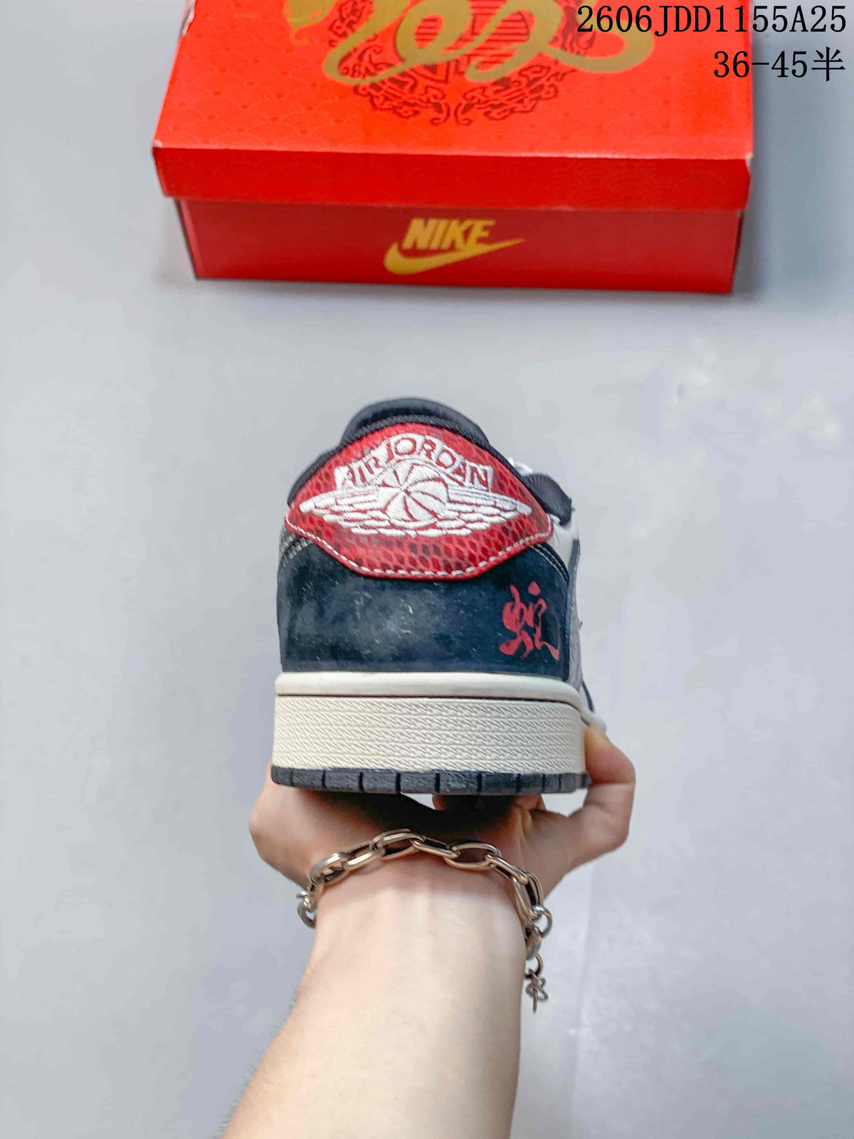 Rear view of the sneaker with a red heel panel and dark navy heel