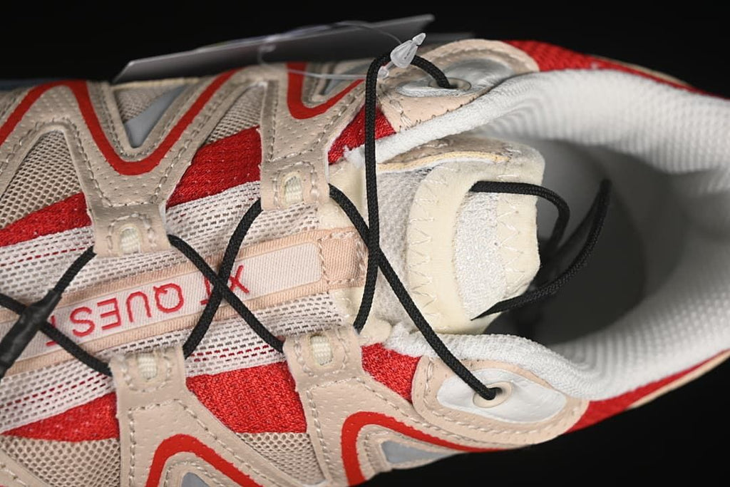 Top detail of the shoe showing its quick-lace system and tongue