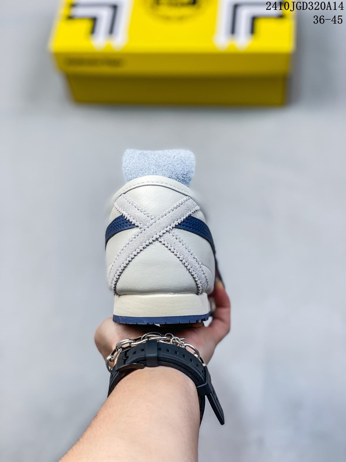 Rear view showing crossed heel overlays on the white sneaker