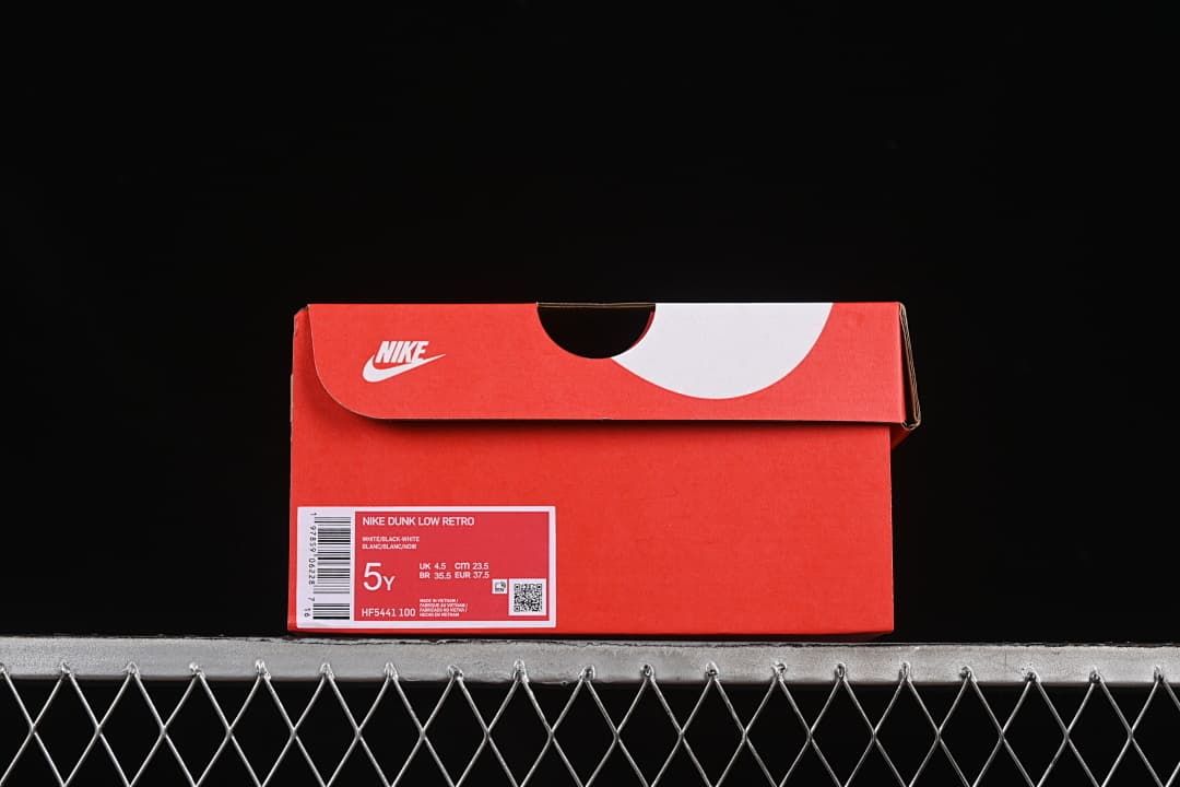 Red shoe box label reading Nike Dunk Low Retro, style HF5441-100, size 5Y