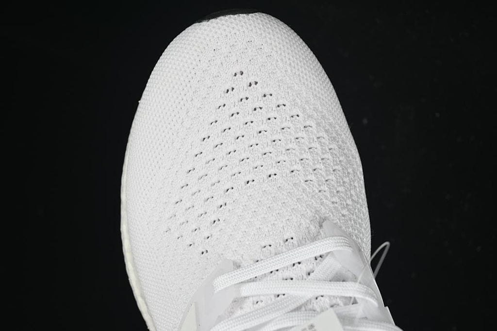 Top-down view of the knit toe box and lacing.