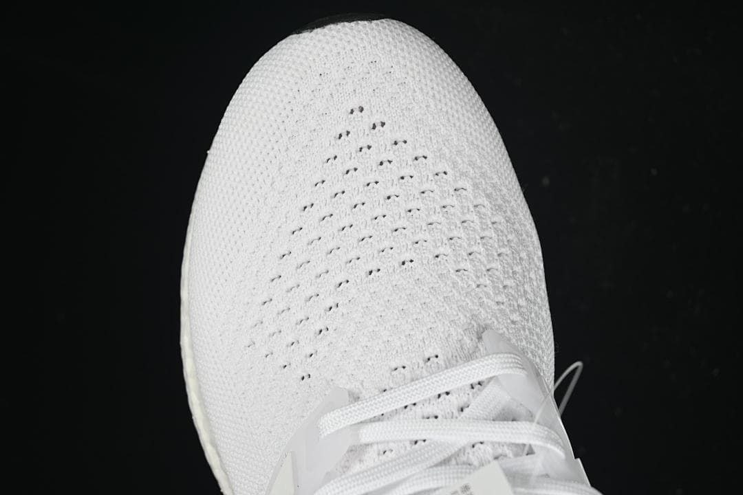 Top-down view of the knit toe box and lacing.