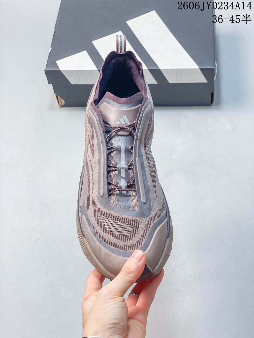 Top view of the Adidas Holo Peak lace-up shoe and patterned upper