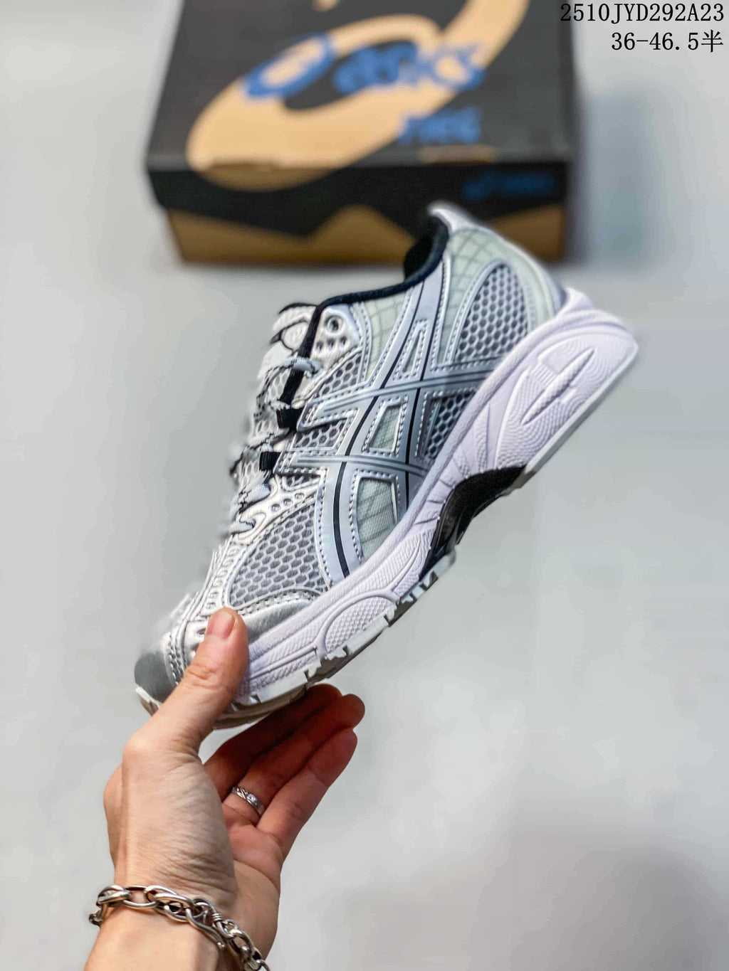Side profile showing the ASICS stripes and sculpted sole