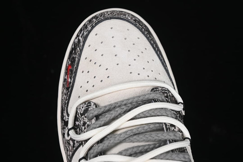 Top view of the perforated toe box and layered laces