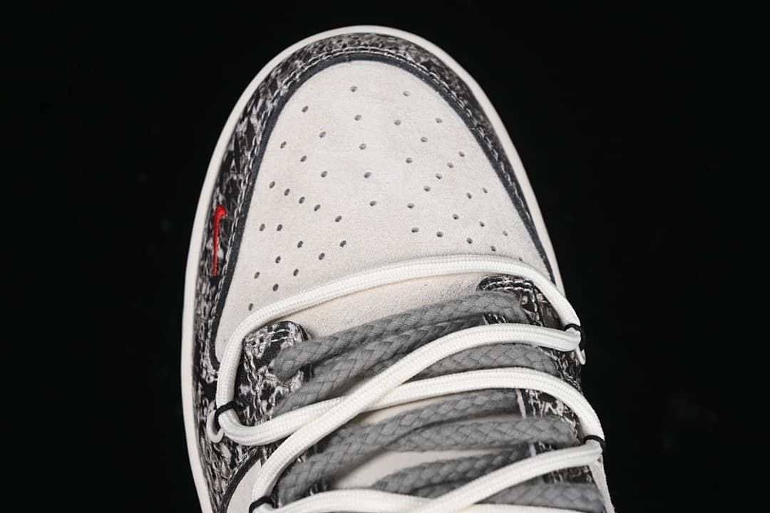 Top view of the perforated toe box and layered laces