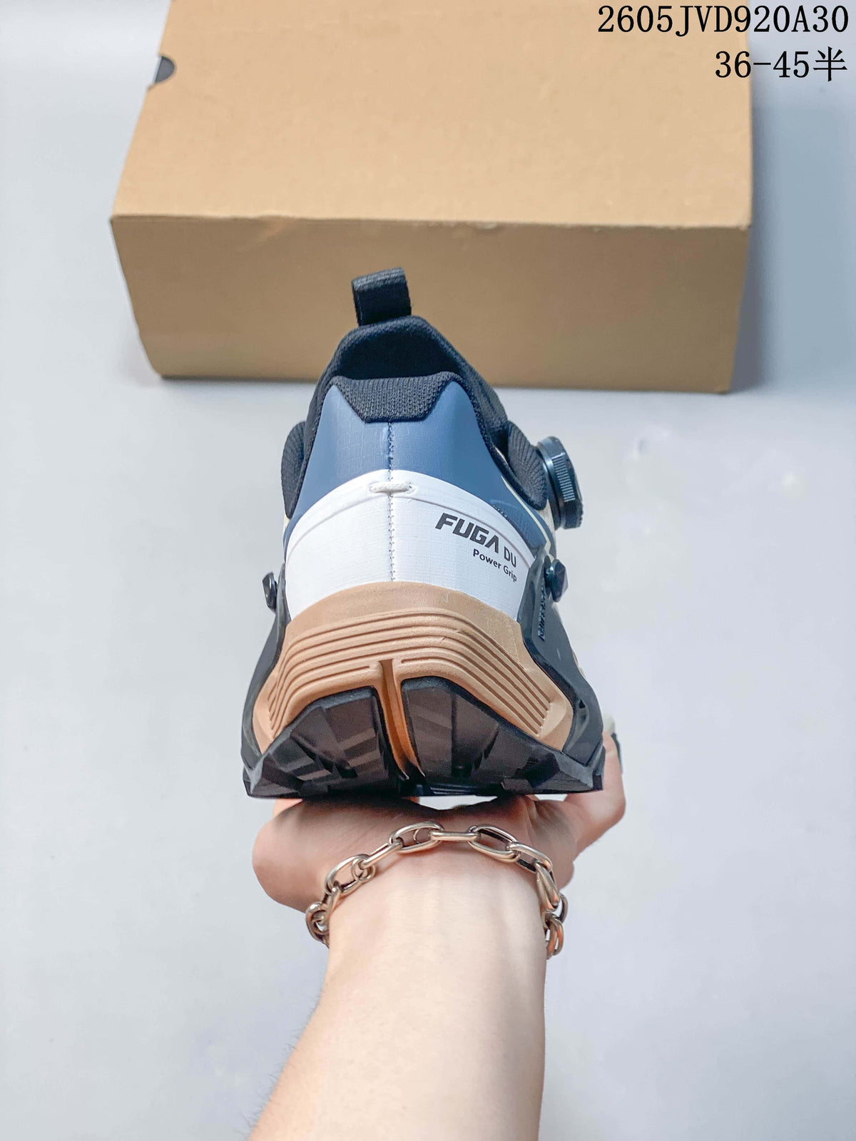 Rear view showing the heel structure and FUGA DU branding