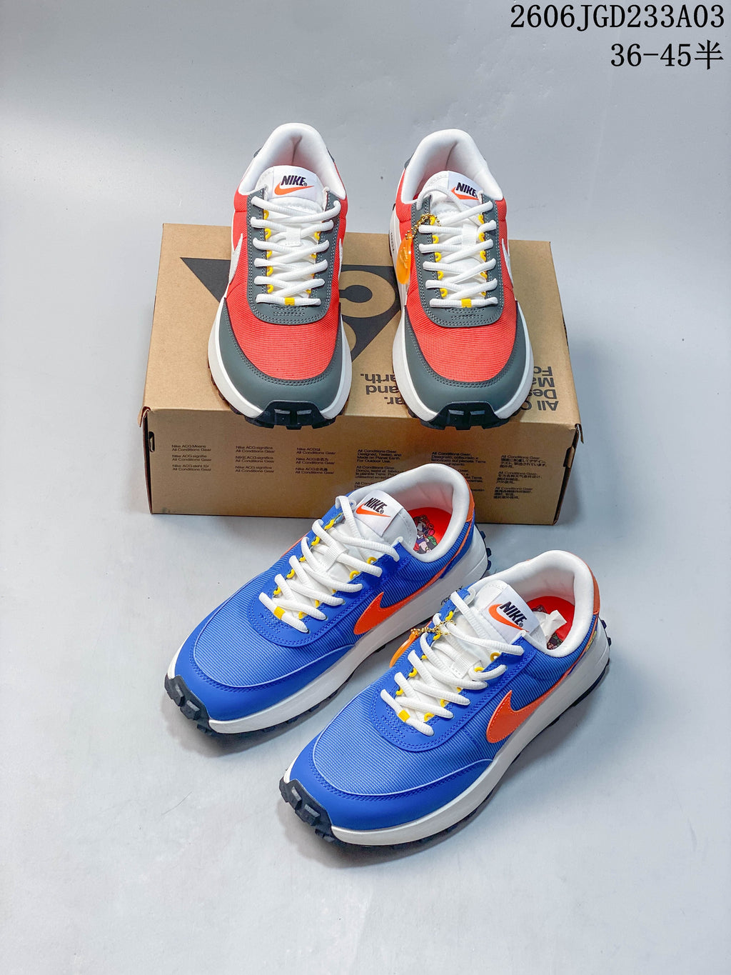 Red and gray and blue and orange Nike ACG sneakers shown together
