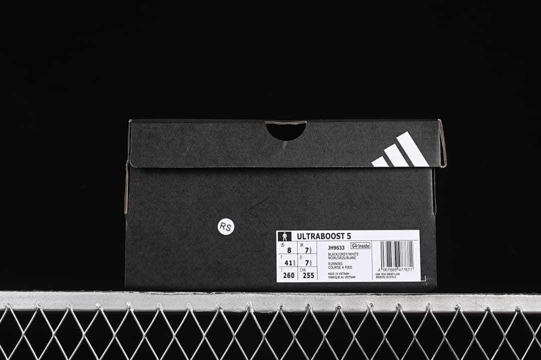 Adidas shoe box label showing Ultraboost 5, JH9633, Black/Grey/White, and sample size details