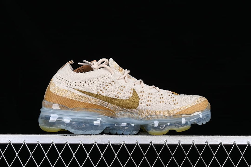 Side profile of the sneaker showing the knit upper, Swoosh, and visible sole.