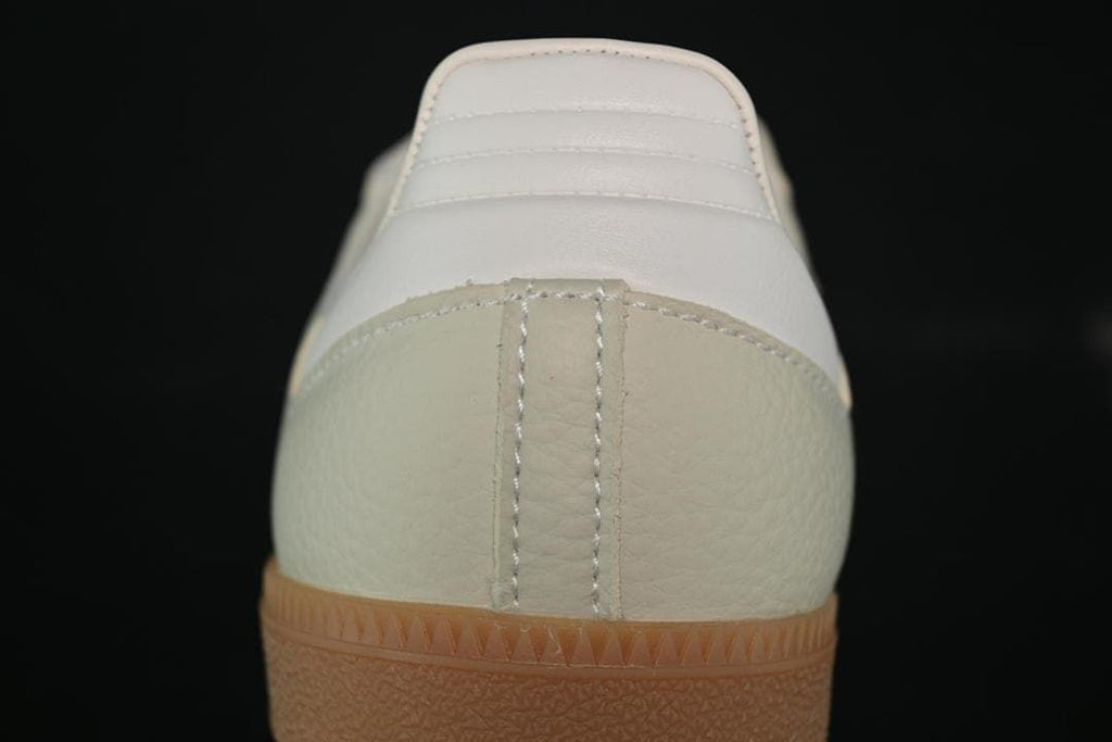 Rear view showing the heel panel, stitching, and gum-look outsole.