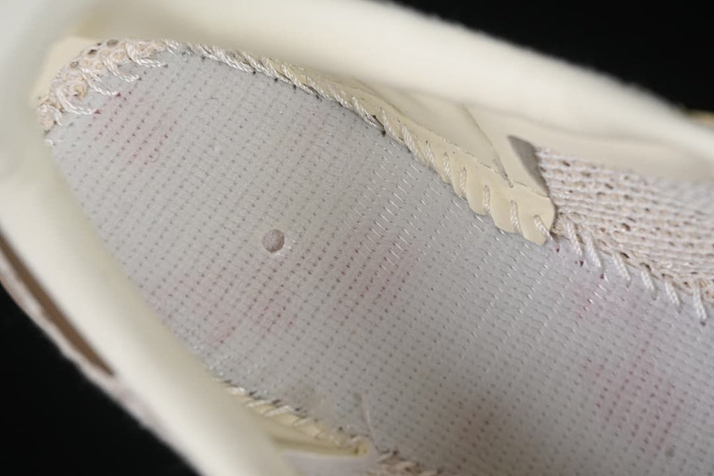 Close-up of the perforated inner lining and stitching
