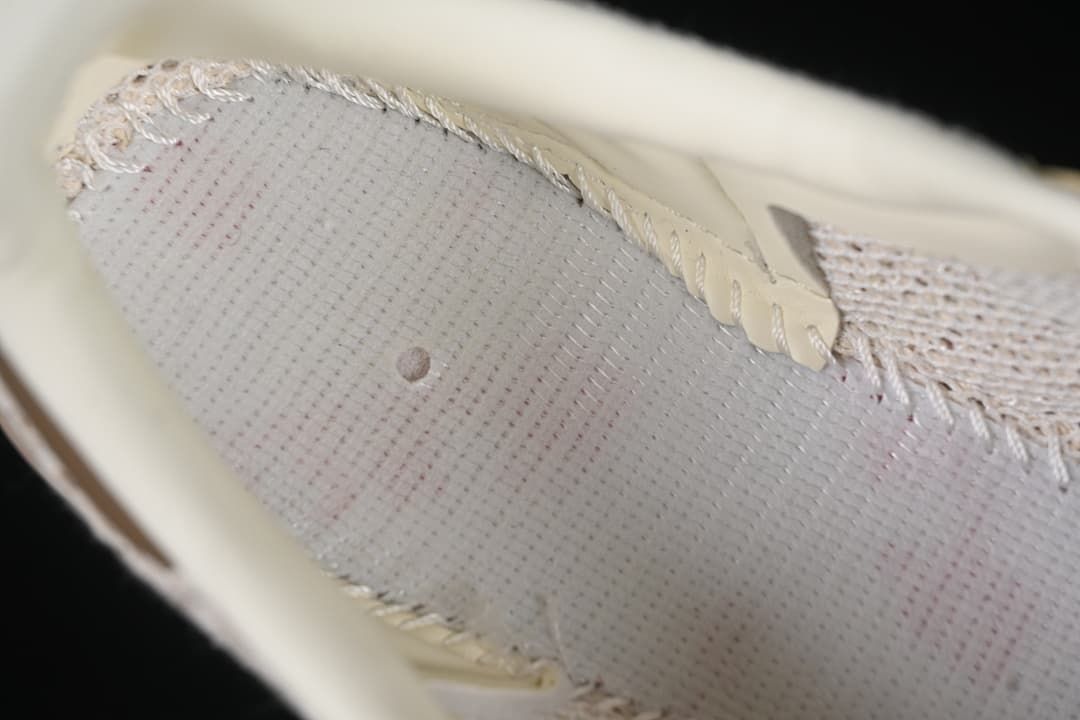 Close-up of the perforated inner lining and stitching