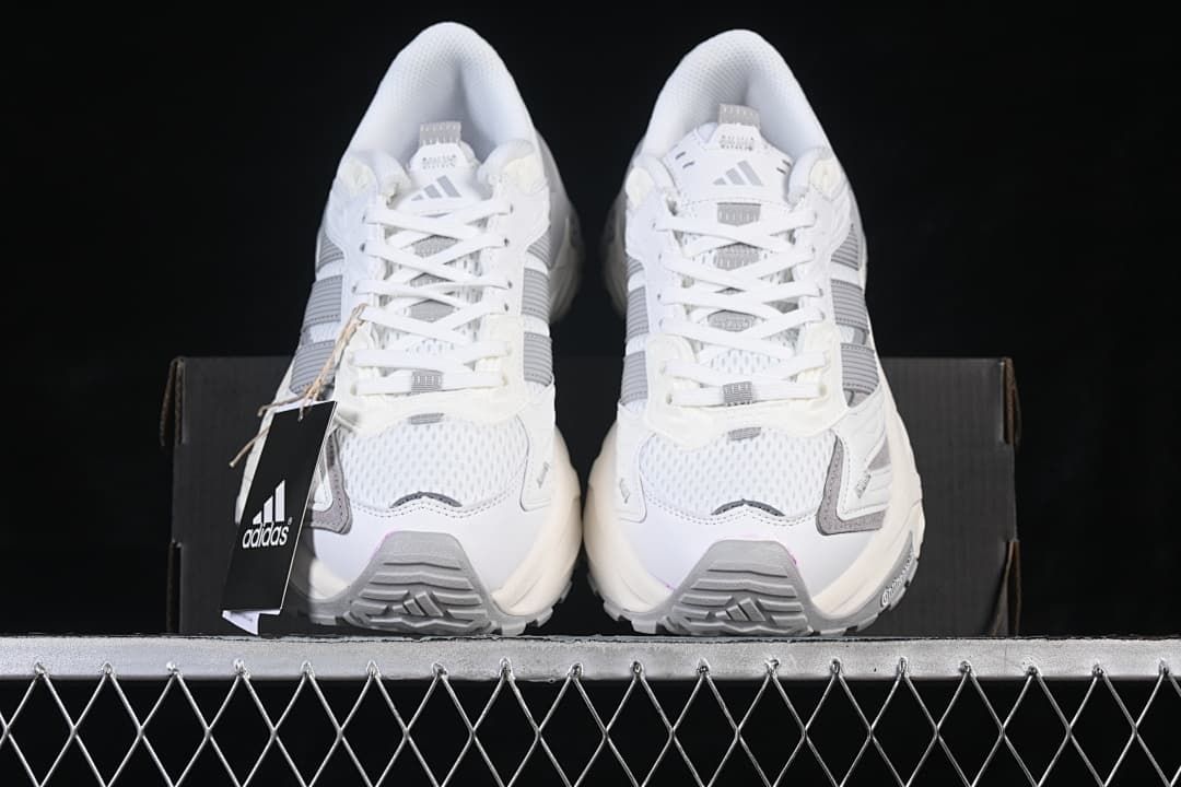 Front view of the pair showing mesh toes and grey accents