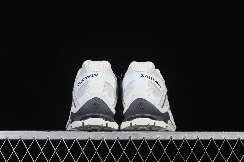 Rear view of the pair showing heel details and tread edges