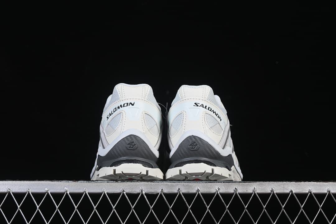 Rear view of the pair showing heel details and tread edges
