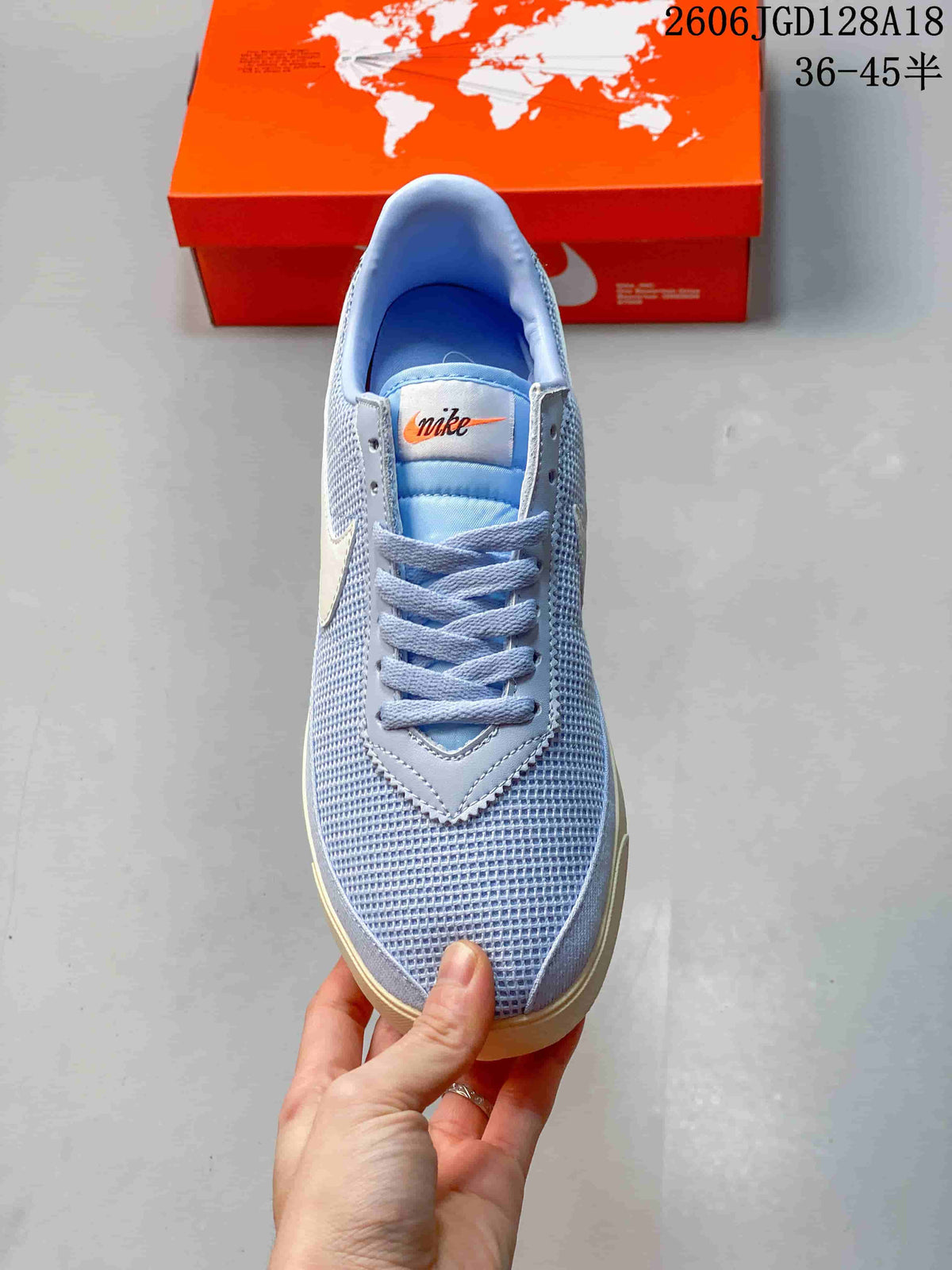 Top view showing the laces, tongue, and mesh-look upper