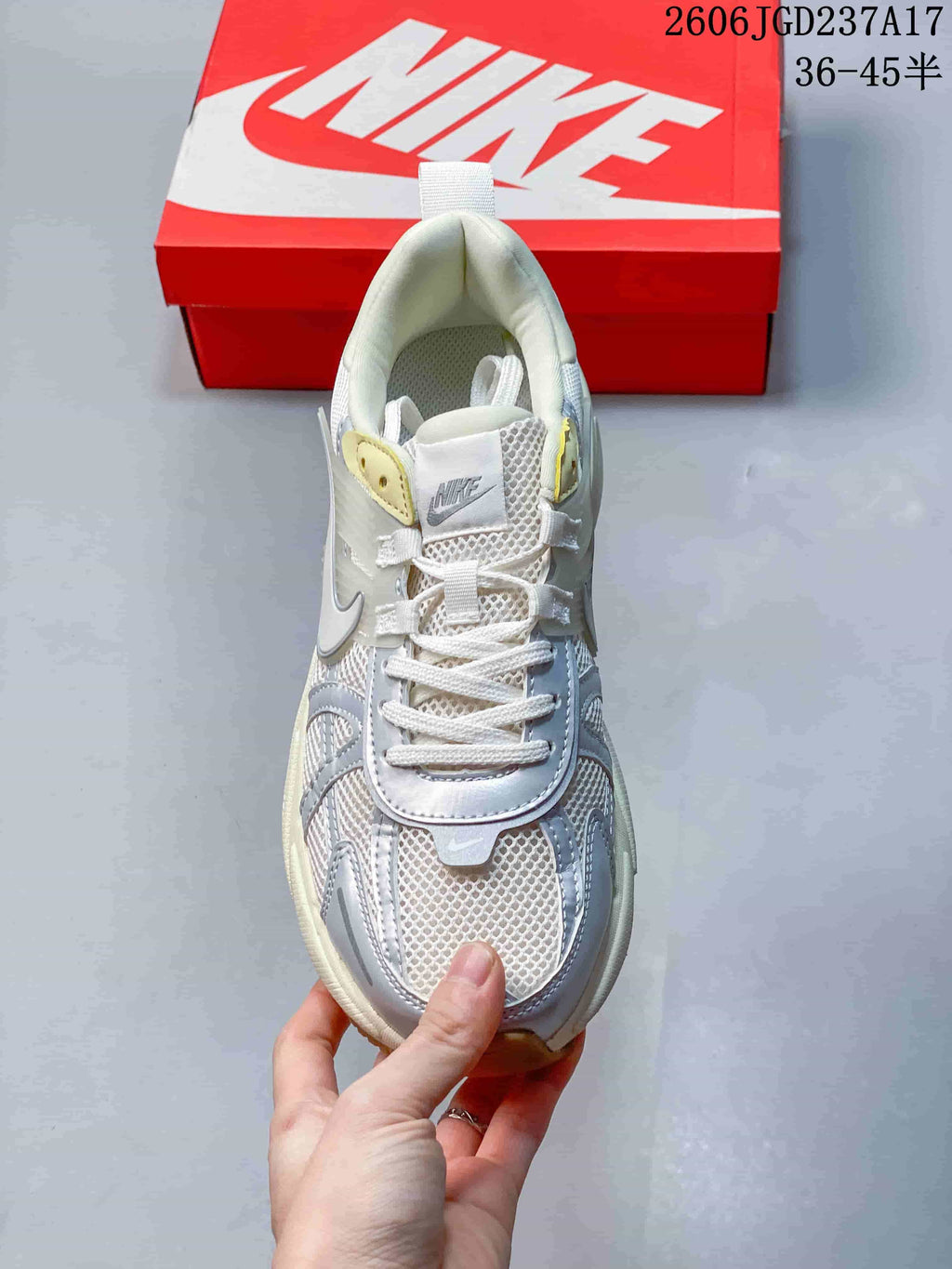 Top view showing the laces, mesh toe, and pale yellow accents.