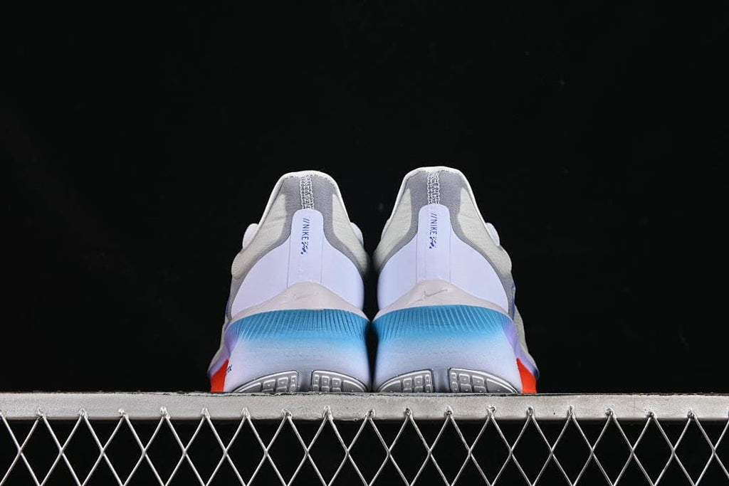 Rear view of the pair showing the heel construction and outsole edges.