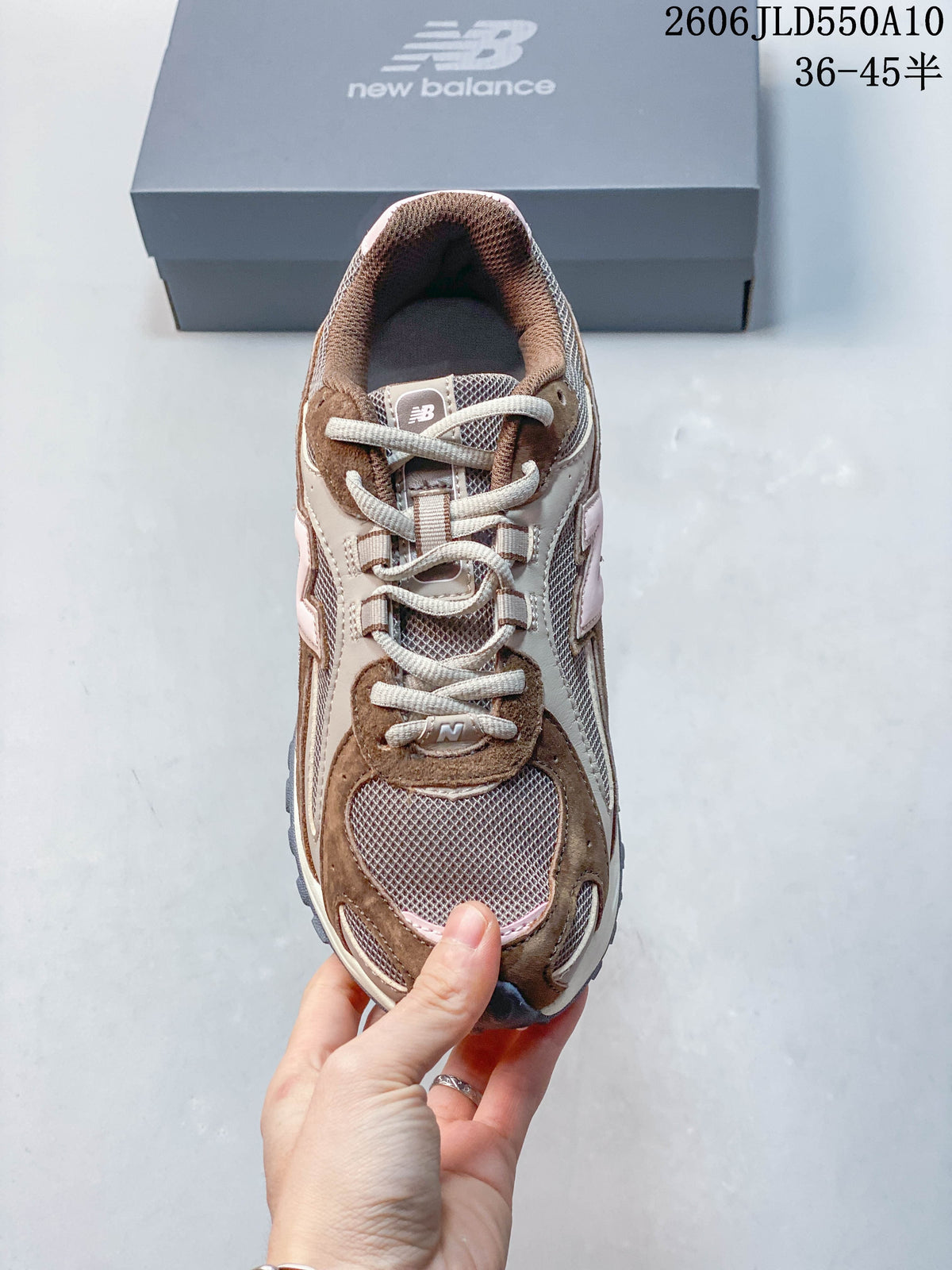Top view of a New Balance 204L sneaker with mesh sections and lace-up closure