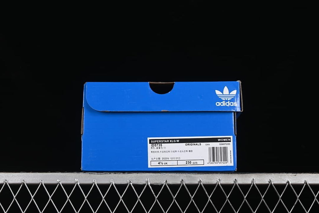 Adidas shoe box label identifying the Superstar XLG W model ID5735 and sample size